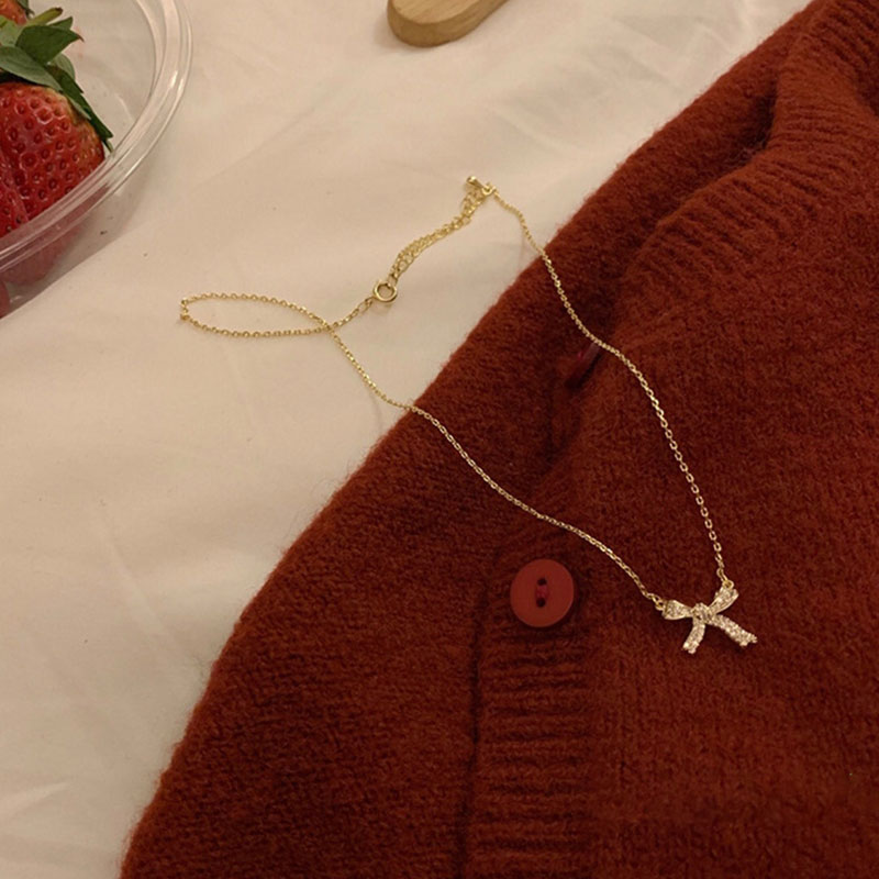 Simple Creative Bow Design Locket Chain Necklace (301096)