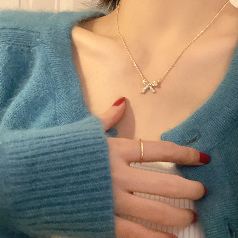 Simple Creative Bow Design Locket Chain Necklace (301096)